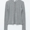 Maglia in lana con mezza abbottonatura
