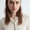 Maglia in lana merino con mezza abbottonatura