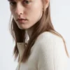 Maglia in lana merino con mezza abbottonatura