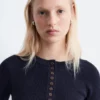 Maglia in lana merino con mezza abbottonatura