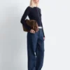 Maglia in lana merino con mezza abbottonatura