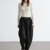 Maglia in lana merino con mezza abbottonatura