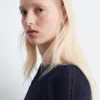 Maglia in lana merino con mezza abbottonatura