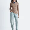 Maglia melange con mezza zip