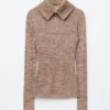Maglia melange con mezza zip