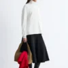Maglione a collo alto con maniche a kimono
