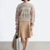 Maglione a righe