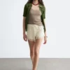 Mini shorts in jacquard con inserti in pizzo
