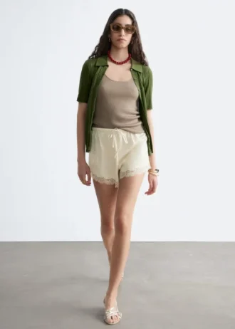 Mini shorts in jacquard con inserti in pizzo