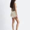 Mini shorts in jacquard con inserti in pizzo