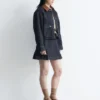 Minigonna in denim plissettato