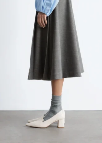 Mocassini con tacco in pelle