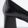 Mocassini con tacco in pelle