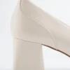 Mocassini con tacco in pelle