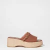 Mules con plateau in pelle scamosciata