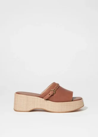 Mules con plateau in pelle scamosciata