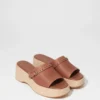 Mules con plateau in pelle scamosciata
