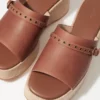 Mules con plateau in pelle scamosciata