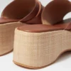 Mules con plateau in pelle scamosciata