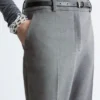 Pantaloni a zampa con piega a pressione