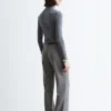 Pantaloni a zampa con piega a pressione