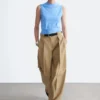 Pantaloni a zampa con pieghe