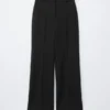 Pantaloni dritti con piega