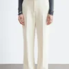 Pantaloni dritti con piega
