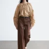 Pantaloni in cotone con piega a pressione