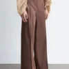 Pantaloni in cotone con piega a pressione