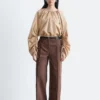 Pantaloni in cotone con piega a pressione