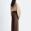 Pantaloni in cotone con piega a pressione