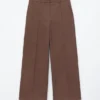 Pantaloni in cotone con piega a pressione