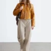 Pantaloni in cotone con pieghe