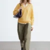 Pantaloni in cotone con pieghe