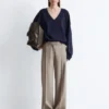 Pantaloni in lana con piega a pressione