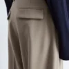 Pantaloni in lana con piega a pressione