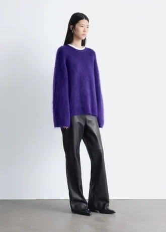 Pantaloni in pelle a zampa