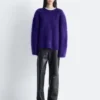 Pantaloni in pelle a zampa