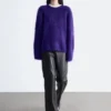 Pantaloni in pelle a zampa