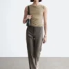 Pantaloni sartoriali con piega a pressione
