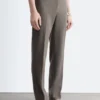Pantaloni sartoriali con piega a pressione