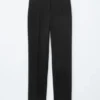 Pantaloni sartoriali con piega a pressione