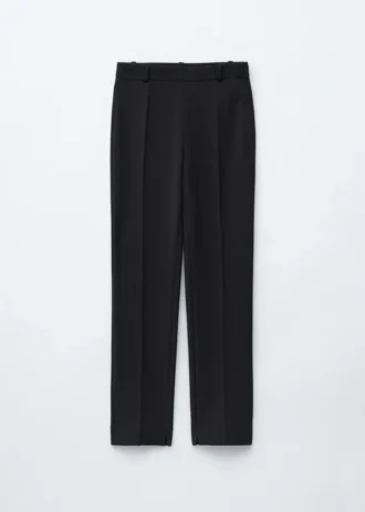 Pantaloni slim con piega a pressione