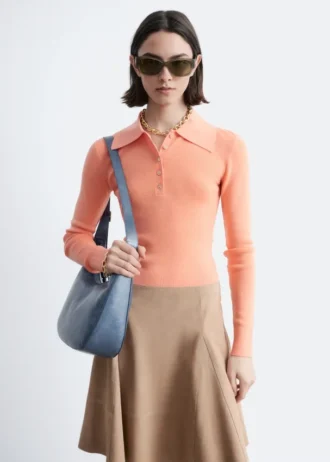 Polo in maglia a costine di lana merino