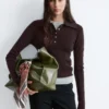 Polo in maglia a costine di lana merino