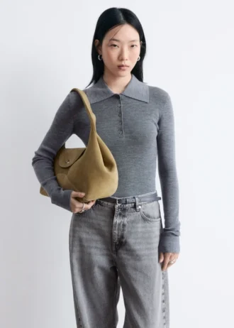 Polo in maglia a costine di lana merino