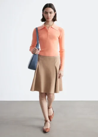 Polo in maglia a costine di lana merino