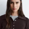 Polo in maglia a costine di lana merino