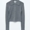Polo in maglia a costine di lana merino